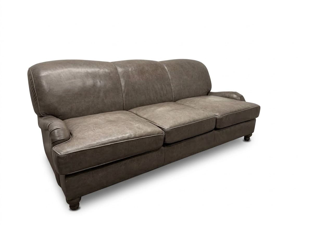 Arhaus English rolled-arm leather sofa in taupe gray on white background