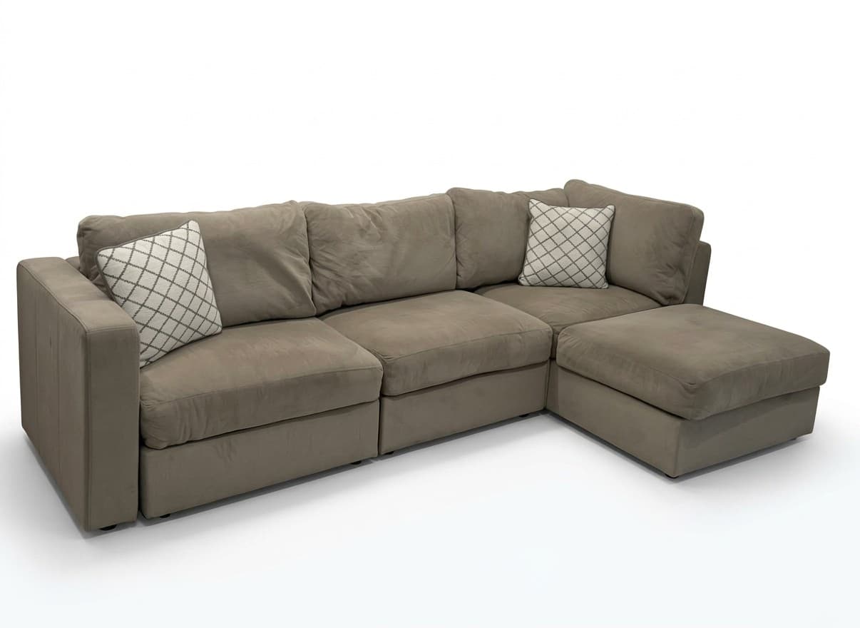Lovesac Sactionals 4-seat modular sectional in taupe padded velvet on white background