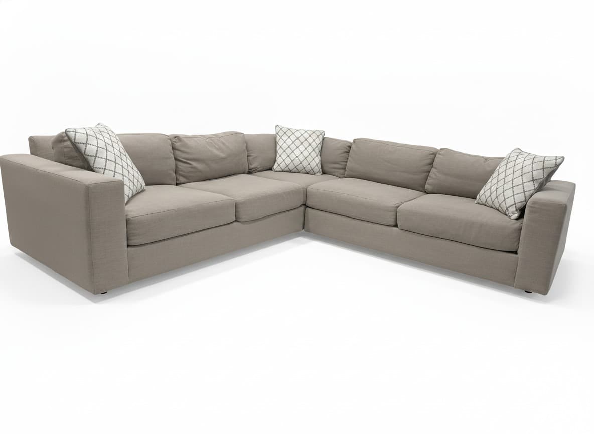 West Elm Urban L-shaped sectional in gray on a white background